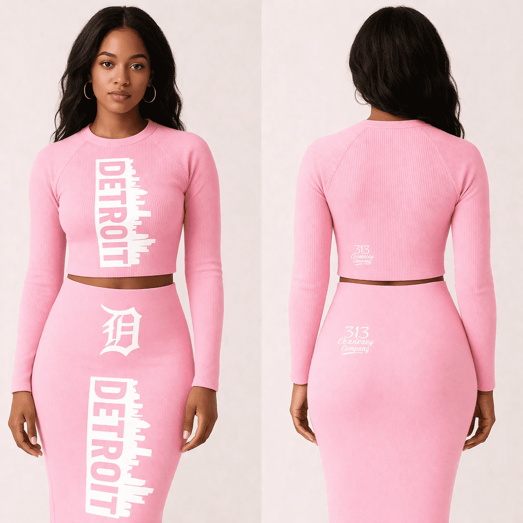 Front and back view of a 313 Emblems black ribbed two-piece set featuring a long-sleeve crop top and midi skirt. Both pieces display the white vertical "DETROIT" skyline graphic and Gothic "D" branding.