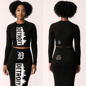 Front and back view of a 313 Emblems black ribbed two-piece set featuring a long-sleeve crop top and midi skirt. Both pieces display the white vertical "DETROIT" skyline graphic and Gothic "D" branding.